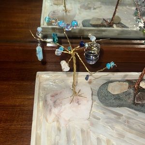 Handmade tree of life with real crystal rock base. Sooo beautiful